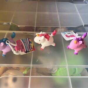 - Colorful Unicorn Keychains three piece pooping, unicorn keychain.